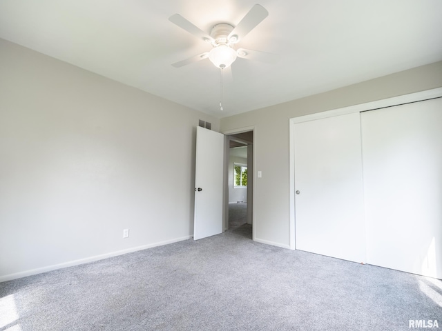 3509 S Dorothy Ct, Bartonville, IL 61607 - unfurnished bedroom featuring carpet flooring, a closet, a ceiling fan, and baseboards