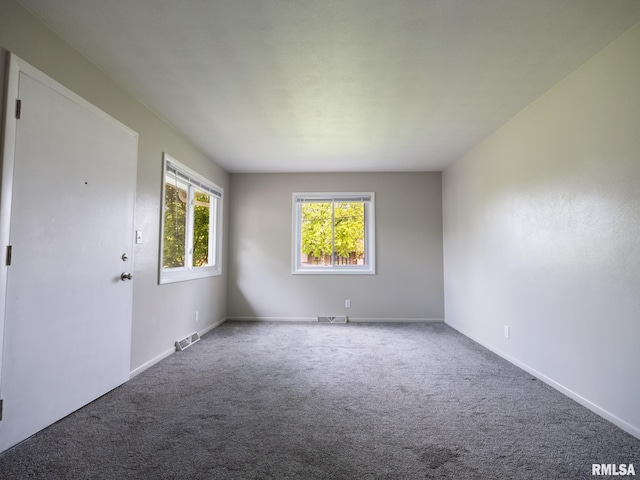 3509 S Dorothy Ct, Bartonville, IL 61607 - spare room featuring carpet flooring and baseboards