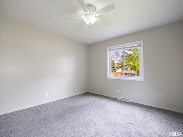 3509 S Dorothy Ct, Bartonville, IL 61607 - spare room with ceiling fan, carpet, and baseboards
