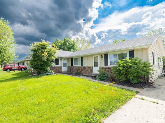 3509 S Dorothy Ct, Bartonville, IL 61607 - ranch-style home featuring a front yard, brick siding, a shingled roof, and board and batten siding