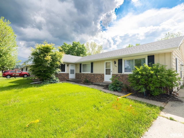 3509 S Dorothy Ct, Bartonville, IL 61607 - ranch-style house with brick siding and a front yard