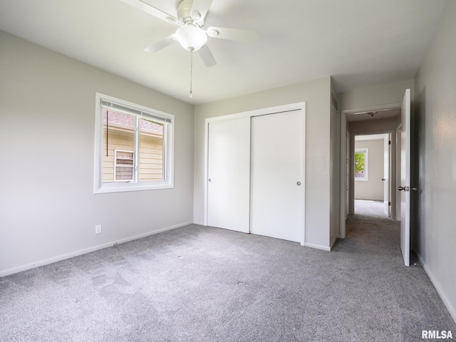 3509 S Dorothy Ct, Bartonville, IL 61607 - unfurnished bedroom with carpet floors, a closet, baseboards, and ceiling fan
