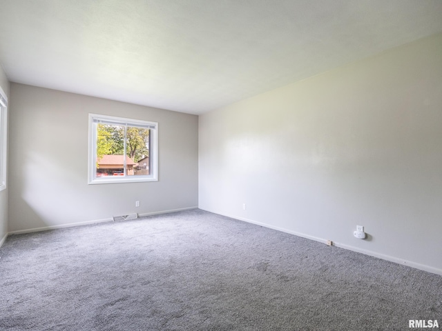 3509 S Dorothy Ct, Bartonville, IL 61607 - spare room featuring carpet flooring and baseboards