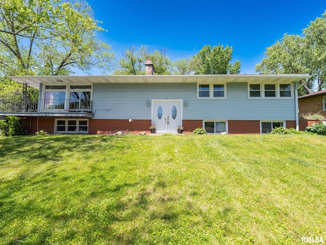 9 Wilmar Ter, East Peoria, IL 61611 - bi-level home with a front yard and a chimney