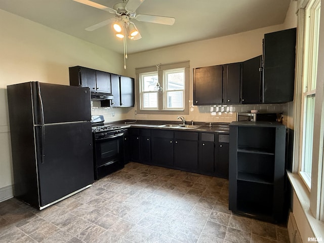 844 Walnut Rd, La Salle, IL 61354 - kitchen with black appliances, dark countertops, a sink, ceiling fan, and tasteful backsplash