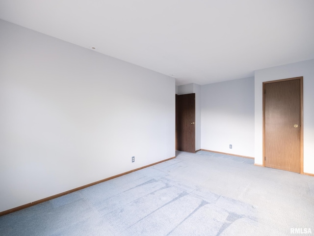 1020 Florence Ave, Pekin, IL 61554 - spare room with light carpet and baseboards