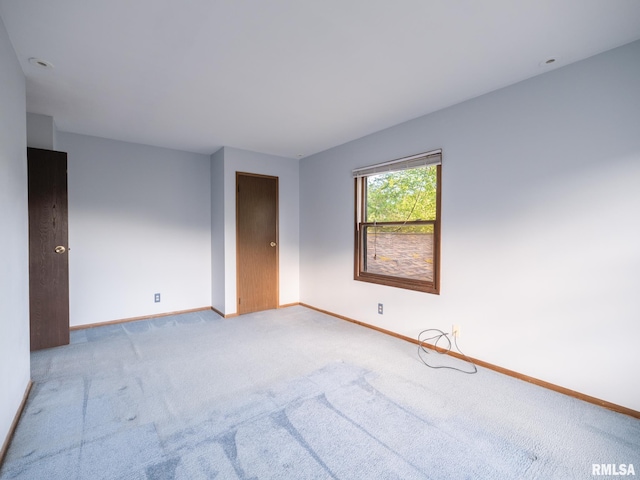 1020 Florence Ave, Pekin, IL 61554 - carpeted empty room featuring baseboards