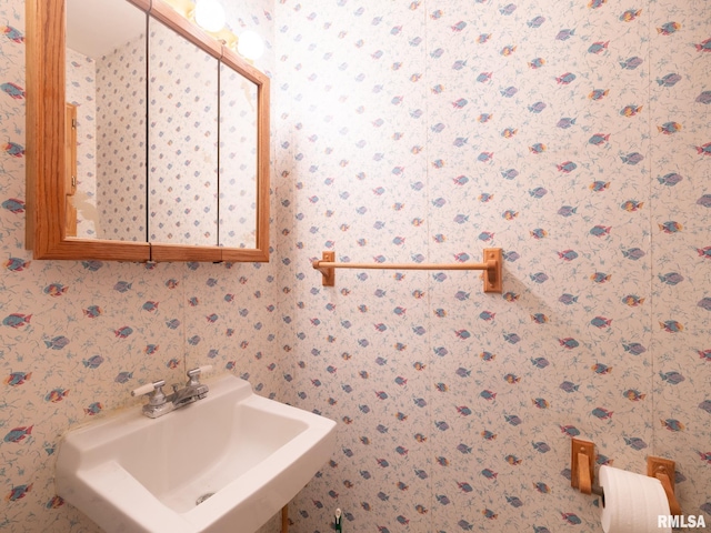 1020 Florence Ave, Pekin, IL 61554 - bathroom with a sink and wallpapered walls