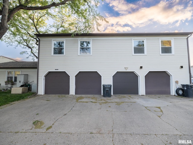 1020 Florence Ave, Pekin, IL 61554 - view of front of house featuring driveway and an attached garage