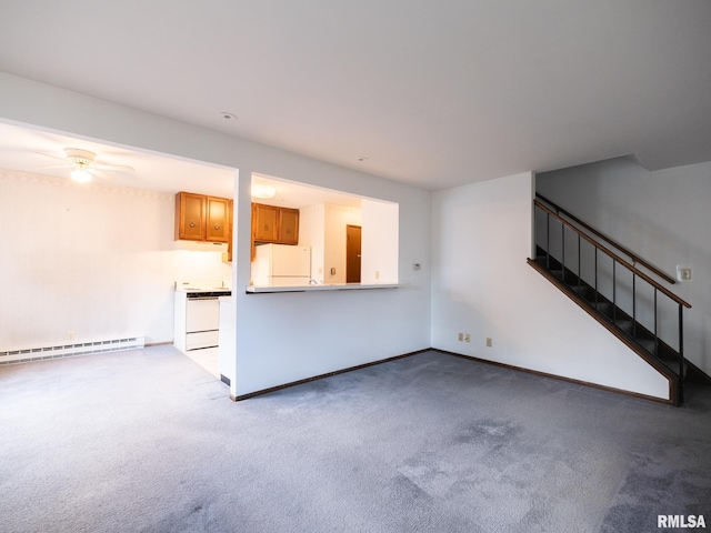 1020 Florence Ave, Pekin, IL 61554 - unfurnished living room with a baseboard heating unit, carpet, stairway, and ceiling fan