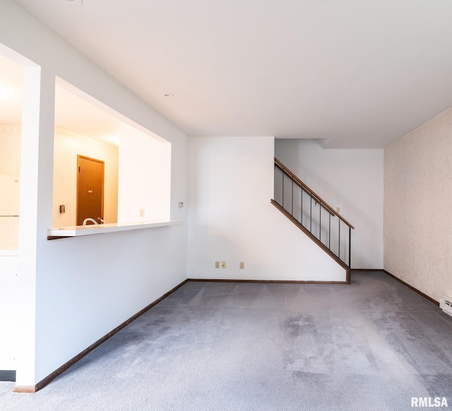 1020 Florence Ave, Pekin, IL 61554 - unfurnished living room with carpet flooring and stairway