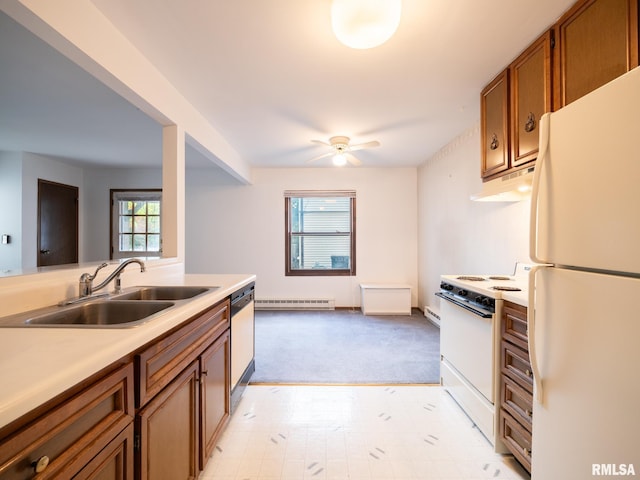 1020 Florence Ave, Pekin, IL 61554 - kitchen featuring white appliances, under cabinet range hood, brown cabinetry, a ceiling fan, and light countertops