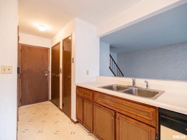 1020 Florence Ave, Pekin, IL 61554 - kitchen with dishwasher, brown cabinets, and light countertops