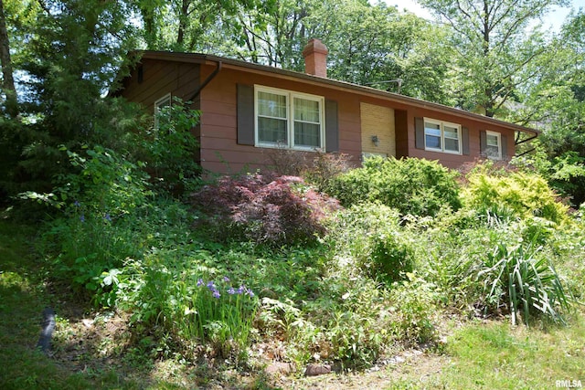 298 Jana Rd, Macomb, IL 61455 - ranch-style house with a chimney