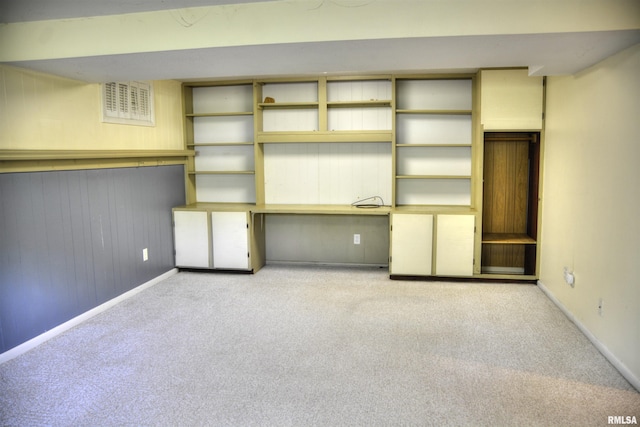 298 Jana Rd, Macomb, IL 61455 - finished below grade area featuring carpet flooring, baseboards, and wood walls