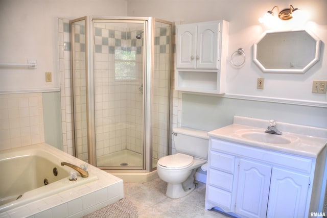 298 Jana Rd, Macomb, IL 61455 - bathroom with a stall shower, a tub with jets, vanity, toilet, and tile patterned floors