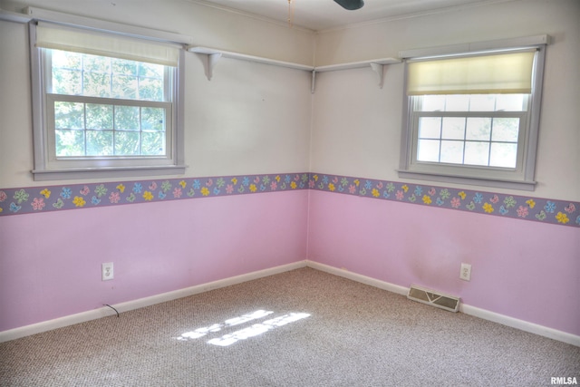 298 Jana Rd, Macomb, IL 61455 - carpeted spare room featuring baseboards