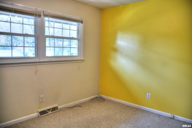 298 Jana Rd, Macomb, IL 61455 - empty room with baseboards and carpet