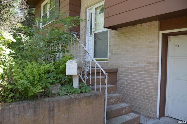 298 Jana Rd, Macomb, IL 61455 - entrance to property with brick siding and a garage
