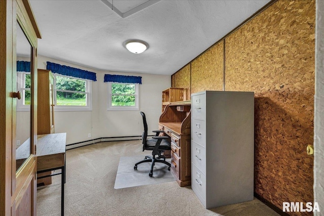 home office featuring a baseboard heating unit, light colored carpet, and a textured ceiling