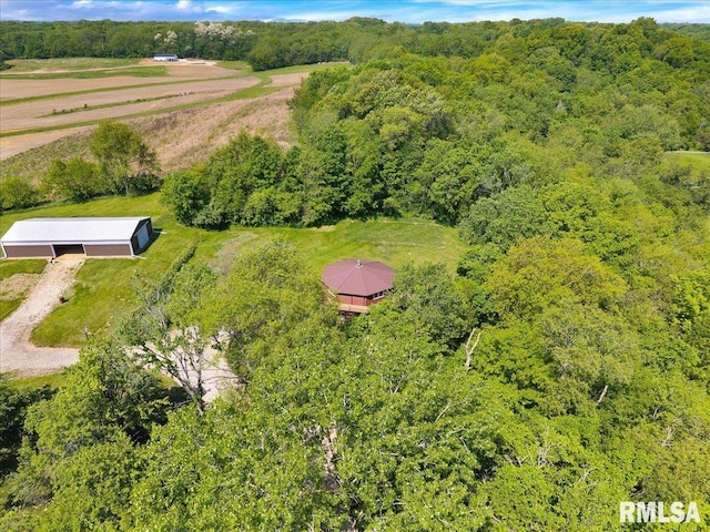 drone / aerial view of a heavily wooded area