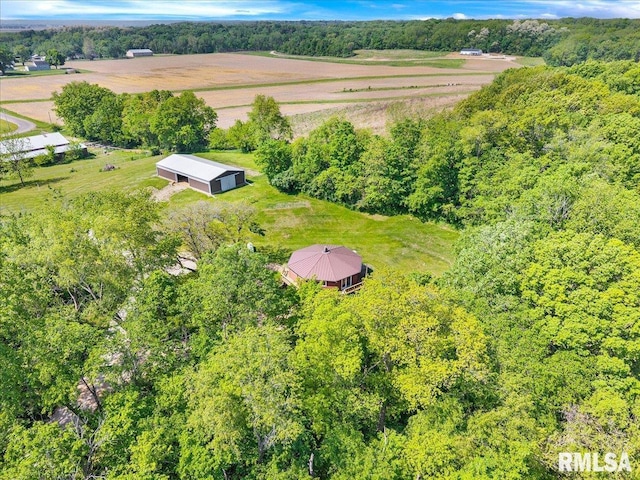overview of rural landscape with a heavily wooded area