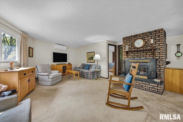 living room with light colored carpet, a brick fireplace, and a wall mounted AC