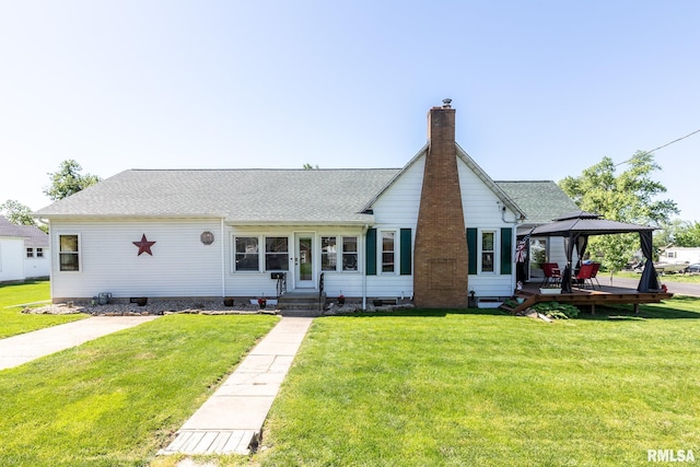 113 W Essex St, Glasford, IL 61533 - view of front of property with a gazebo, a chimney, and a front lawn
