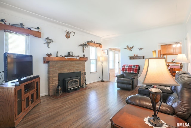113 W Essex St, Glasford, IL 61533 - living room featuring healthy amount of natural light, wood finished floors, and baseboards