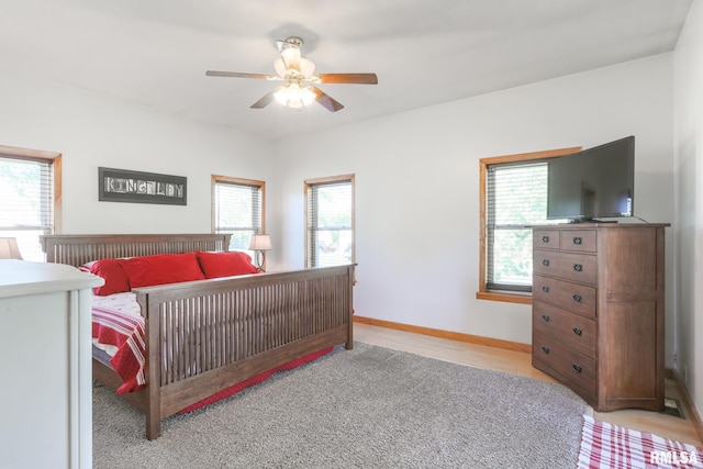 113 W Essex St, Glasford, IL 61533 - bedroom featuring multiple windows, ceiling fan, and baseboards