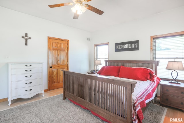 113 W Essex St, Glasford, IL 61533 - bedroom featuring light wood-style floors and a ceiling fan