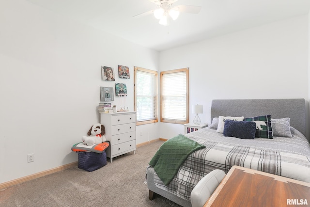 113 W Essex St, Glasford, IL 61533 - bedroom with carpet, baseboards, and a ceiling fan