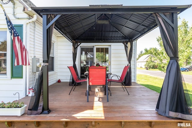 113 W Essex St, Glasford, IL 61533 - wooden terrace featuring a gazebo and outdoor dining area