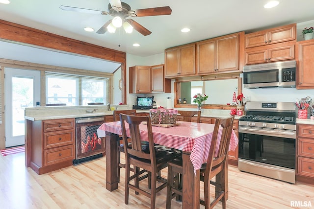 113 W Essex St, Glasford, IL 61533 - kitchen with stainless steel appliances, light wood-style floors, recessed lighting, ceiling fan, and light countertops