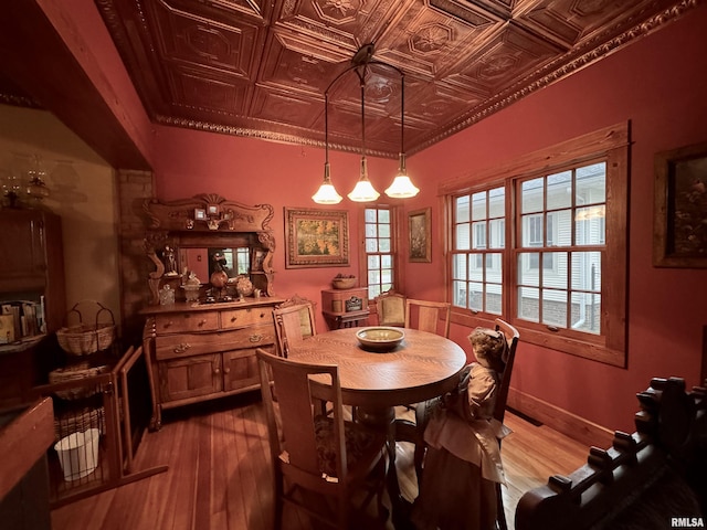 429 S Madison St, Macomb, IL 61455 - dining space with wood-type flooring and an ornate ceiling