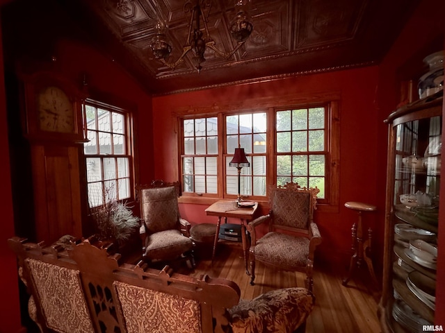 429 S Madison St, Macomb, IL 61455 - living area with an ornate ceiling, wood finished floors, and plenty of natural light