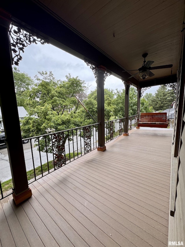 429 S Madison St, Macomb, IL 61455 - wooden terrace with ceiling fan