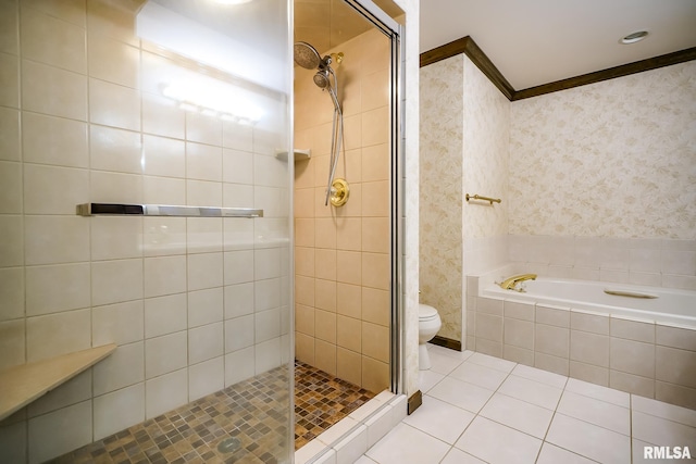 bathroom with tile patterned floors, a stall shower, a bath, toilet, and crown molding