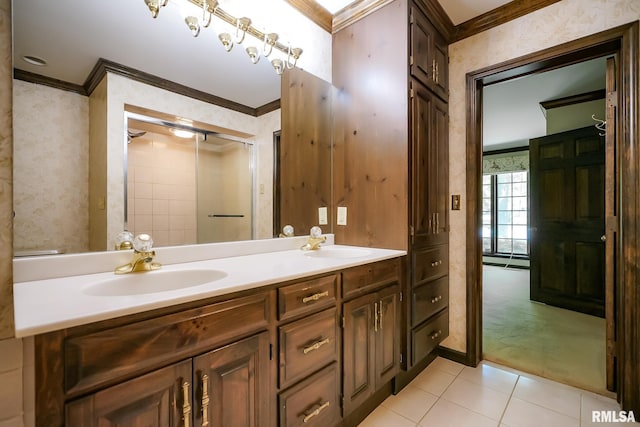 full bathroom featuring ornamental molding, a shower stall, tile patterned floors, and double vanity