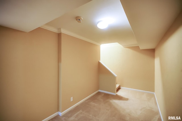 staircase with carpet, baseboards, and ornamental molding