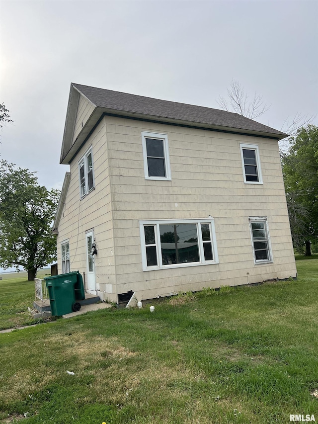 221 N Bernadotte St, Ipava, IL 61441 - back of house with a yard