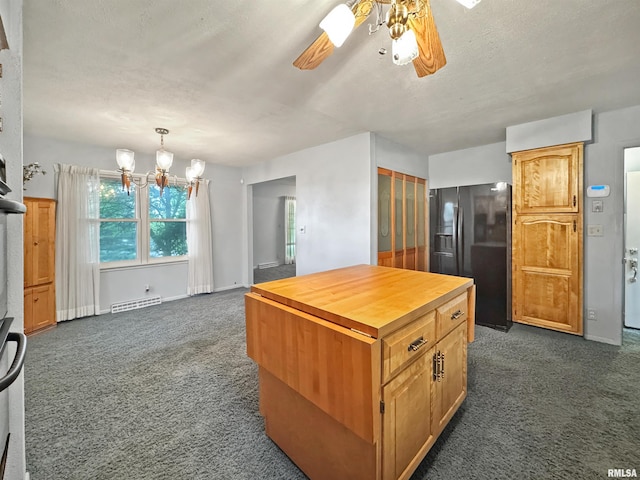 6006 N Big Hollow Rd, Peoria, IL 61615 - kitchen with black fridge with ice dispenser, dark carpet, butcher block countertops, ceiling fan, and a textured ceiling