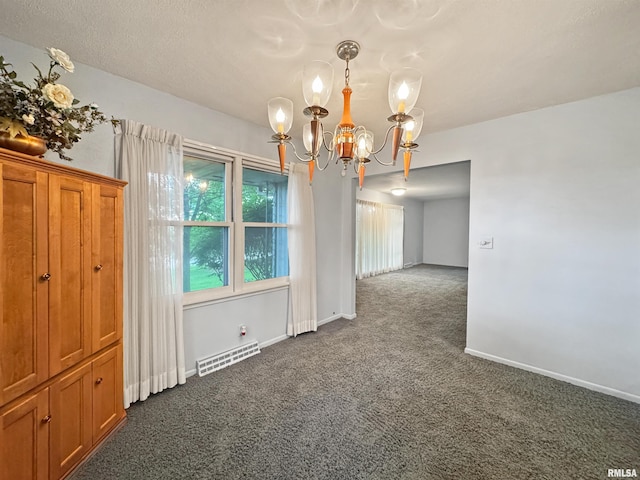 6006 N Big Hollow Rd, Peoria, IL 61615 - unfurnished dining area with dark colored carpet, a chandelier, and baseboards