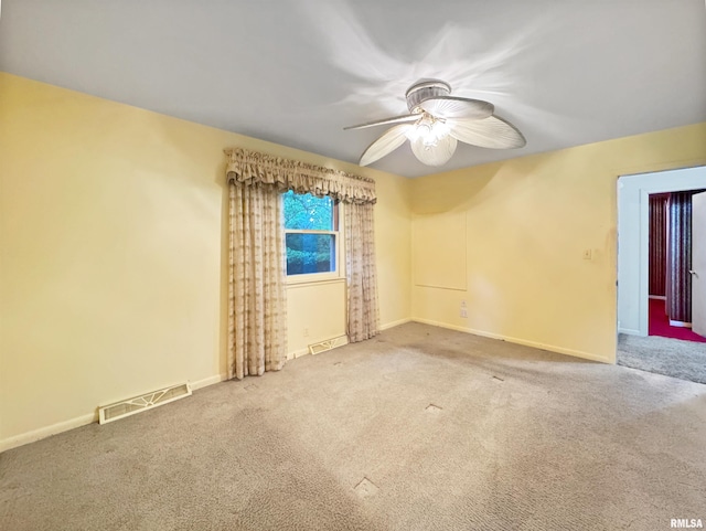 6006 N Big Hollow Rd, Peoria, IL 61615 - carpeted empty room featuring a ceiling fan and baseboards