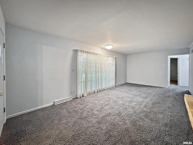6006 N Big Hollow Rd, Peoria, IL 61615 - carpeted spare room featuring baseboards