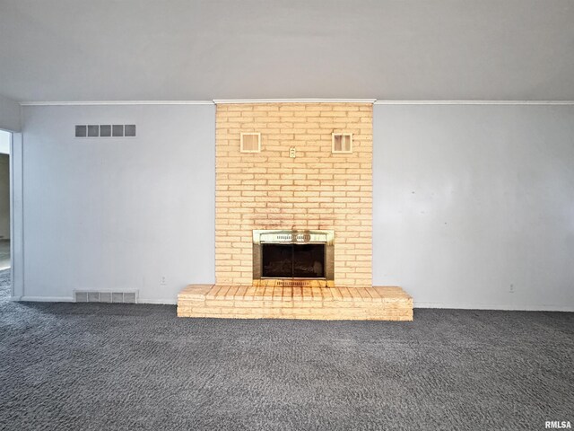 6006 N Big Hollow Rd, Peoria, IL 61615 - unfurnished living room with carpet, a brick fireplace, and crown molding
