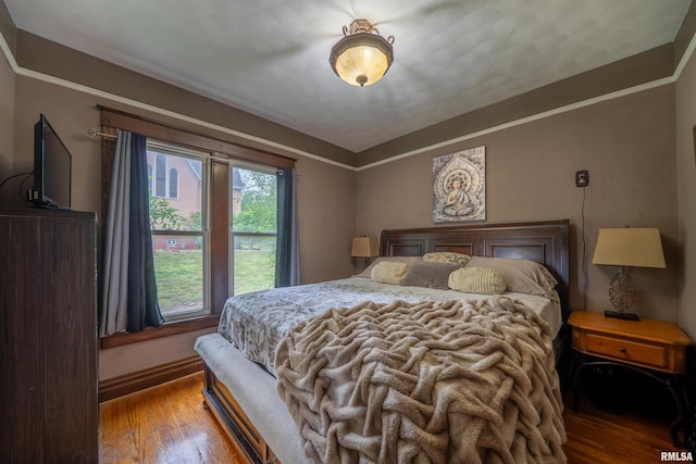 405 Washington St, Pekin, IL 61554 - bedroom with wood finished floors and baseboards