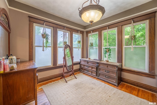 405 Washington St, Pekin, IL 61554 - sitting room featuring plenty of natural light, baseboards, and wood finished floors