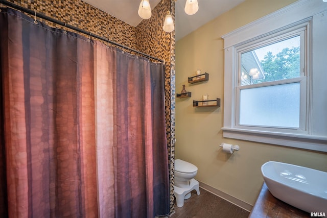 405 Washington St, Pekin, IL 61554 - full bath featuring toilet, wood finished floors, baseboards, a shower with curtain, and a sink