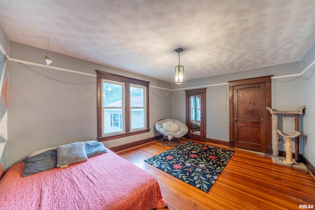 405 Washington St, Pekin, IL 61554 - bedroom with wood finished floors and baseboards
